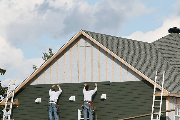 Professional Siding technician working in Enfield, CT